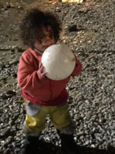 refugee child with ball